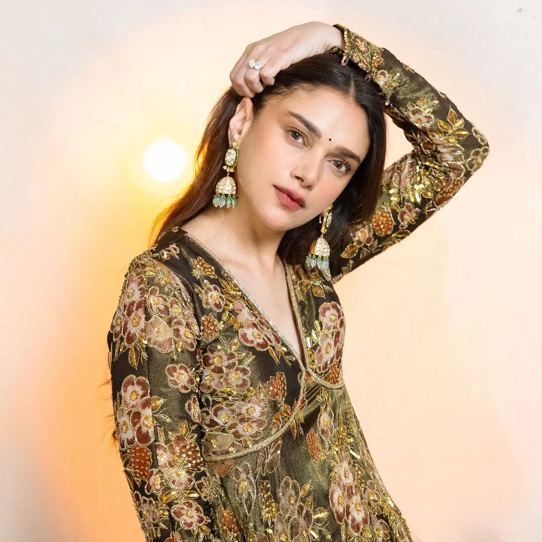 Hindi Actress Aditi Rao Hydari Stills In Green Designer Gown